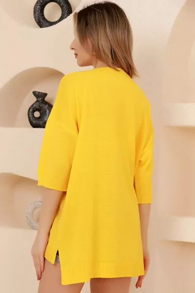 Maglione basic lavorato a maglia, collo a V, manica a tre quarti, scollo posteriore lungo, parte anteriore corta con spacco, taglio ampio, adatto a tutte le stagioni