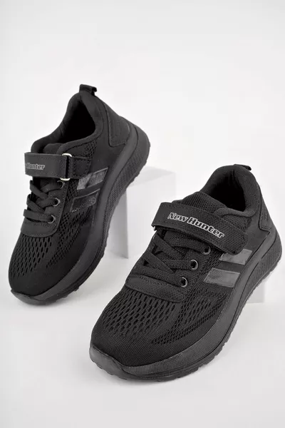 Flache schwarze Kinder Sneakers