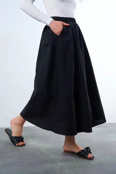 Gonna nera a balze in lino a vita alta da donna