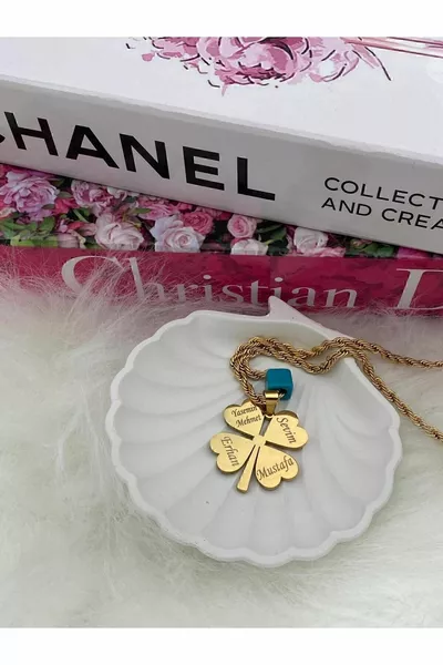 Collana trifoglio con nome catena a torsione in acciaio dorato