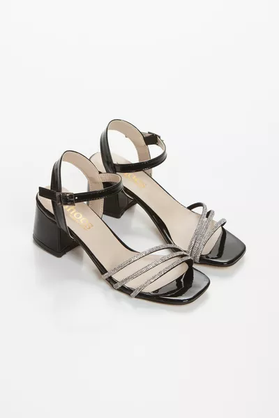 المرأة الحجر الأسود فساتين السهرة الموسم الجديد