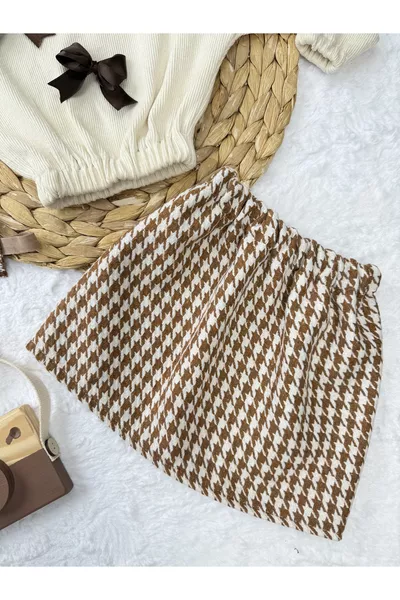 طقم بنات للأطفال ورضع مكون من بودي بفيونكة وتنورة بنقشة الحداد وربطة رأس