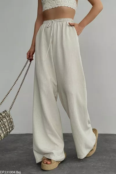 بنطال كتان نسائي بيج بحزام خلفي مزدوج الجيوب