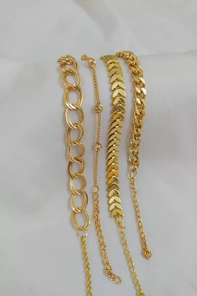 Женский комплект браслетов с позолотой