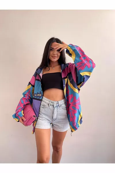 معطف واق من المطر كبير الحجم بنقشة وسحاب