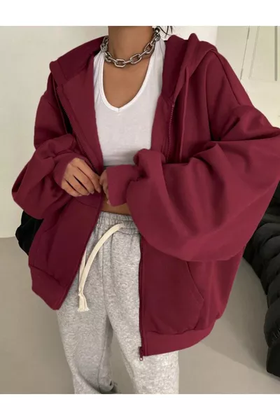 كنزة نسائية بأكمام بالون بسحّاب وتفاصيل على غطاء الرأس باللون العنابي