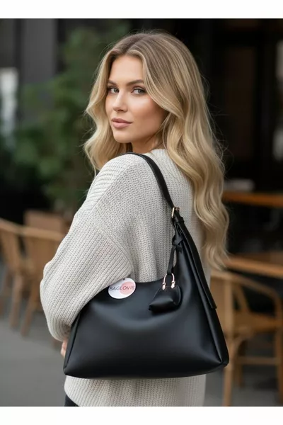 حقيبة كتف نسائية سوداء صغيرة مع محفظة، بتفاصيل مشبك للحمالة، الحجم: الطول  سم، العرض  سم