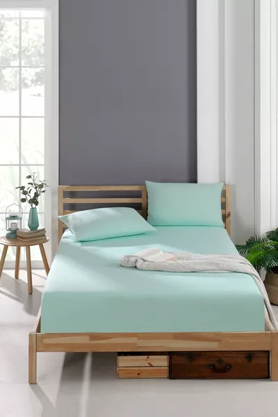 طقم ملاءات بأغطية مطاطية ووسائد من قماش أكفيل