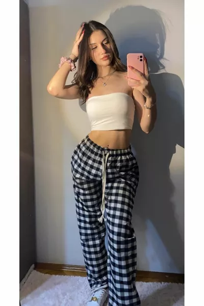 Pantaloni da pigiama unisex oversize neri e bianchi a quadri a motivo scozzese