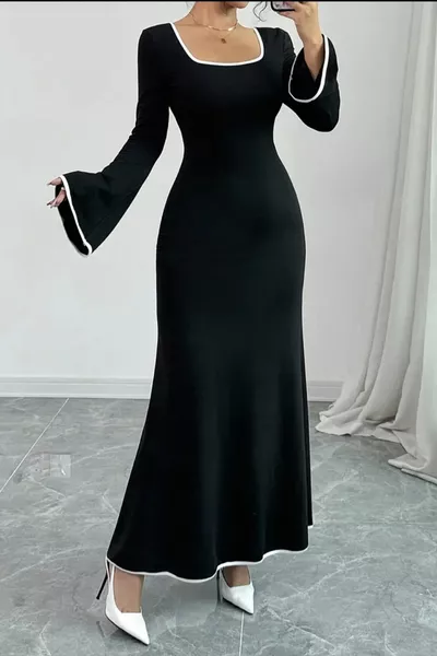 فستان نسائي برقبة على شكل حرف U أسود بحواف بيضاء من القماش المحبوك