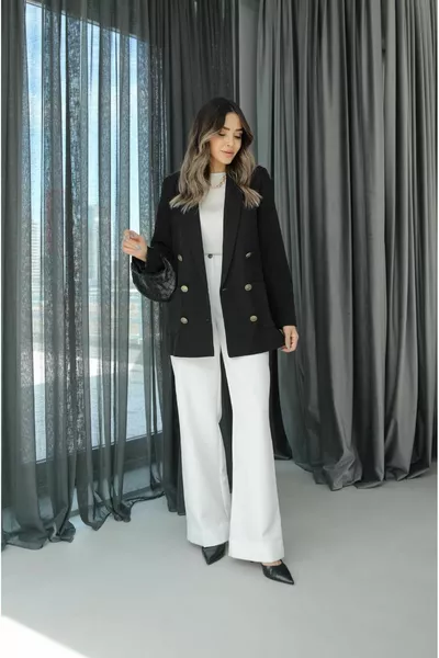 Pantalon palazzo à boutons blancs