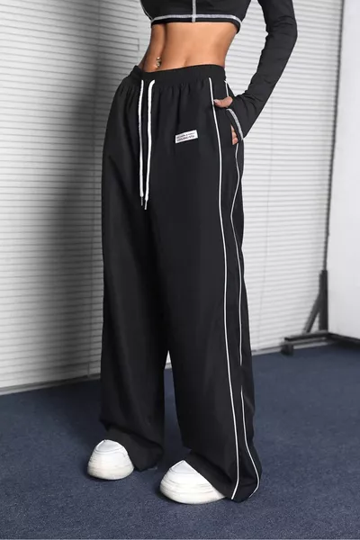 Pantaloni da tuta donna neri a vita alta, doppio filo, gamba larga, oversize