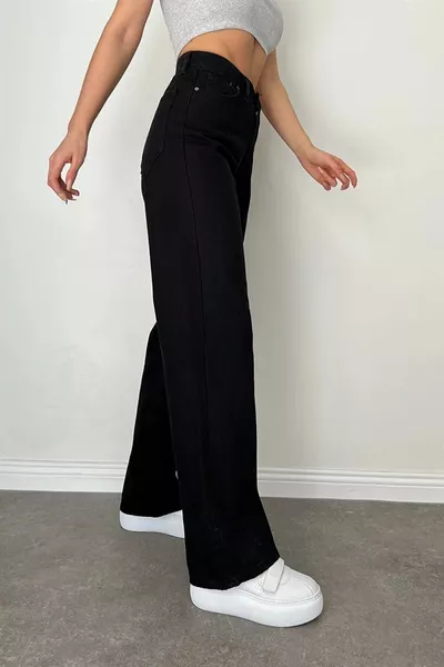 Penelope Power Lycra Jeans en denim noir taille super haute jambe shabby pour femme