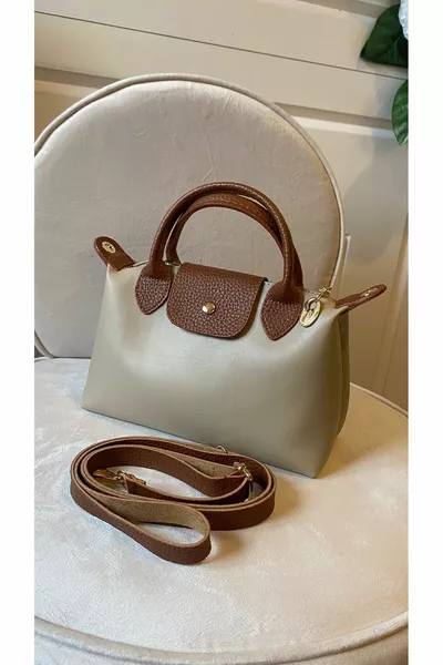 متجر حقائب نسائية بسحاب وإغلاق بزر مضغوط للكتف واليد