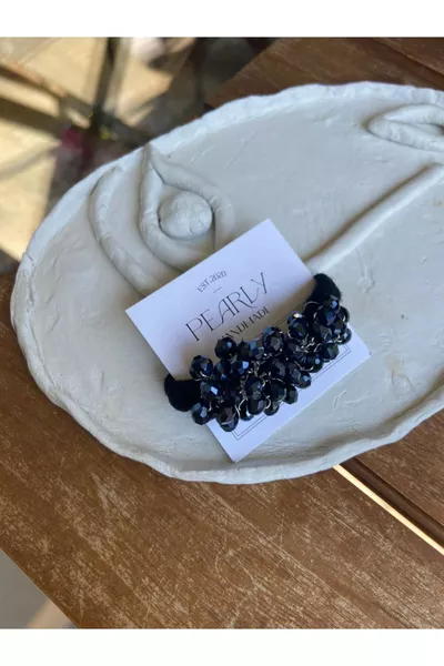 مشبك شعر مطاطي من الكريستال الأزرق الداكن