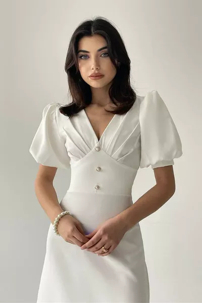 فستان متوسط الطول نسائي بياقة V باللون الأبيض مع أكمام بالون وتفاصيل أزرار