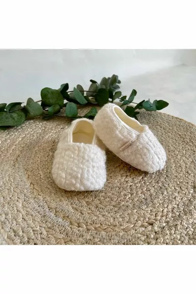 Stivaletti per bambini in agnello color crema