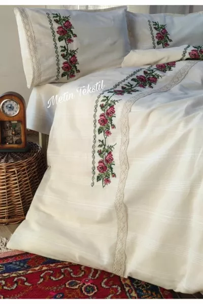 Beddengoedset met borduurwerk