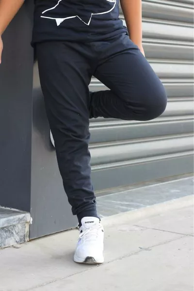 Pantaloni della tuta neri da ragazzo con tasche