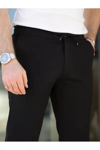 بنطال جوغر من قماش مريح أنيق سهل الكي بقصة مريحة ضيقة