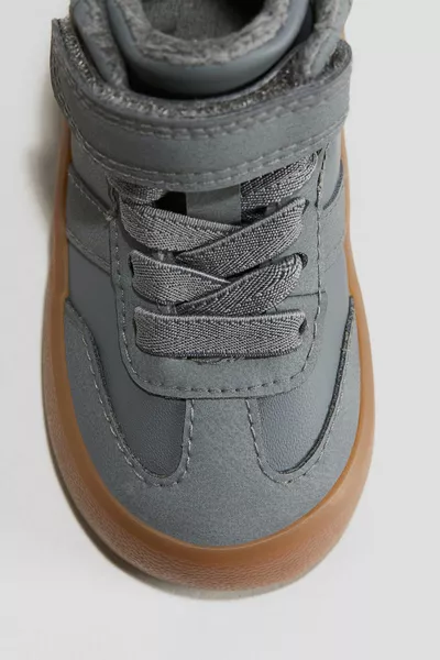 حذاء رياضي مبطن بحرارة عالية الرقبة