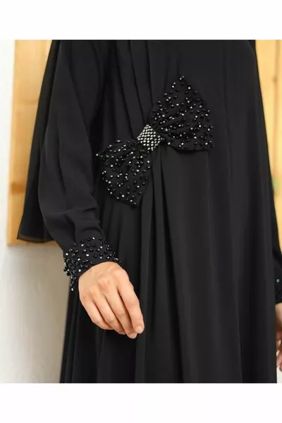 فساتين السهرة تفاصيل القوس