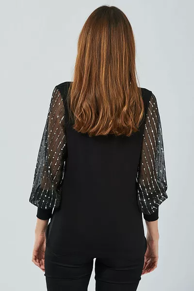 Camicetta nera con paillettes da donna 