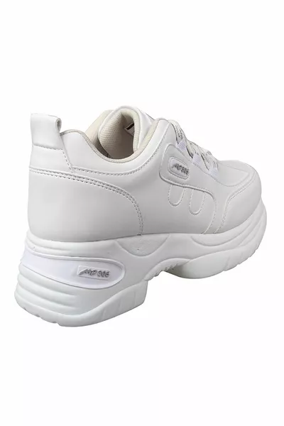 Женские кроссовки на высокой подошве 