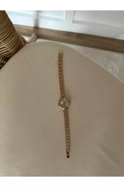 ساعة يد بنفسجية (ذهبي)