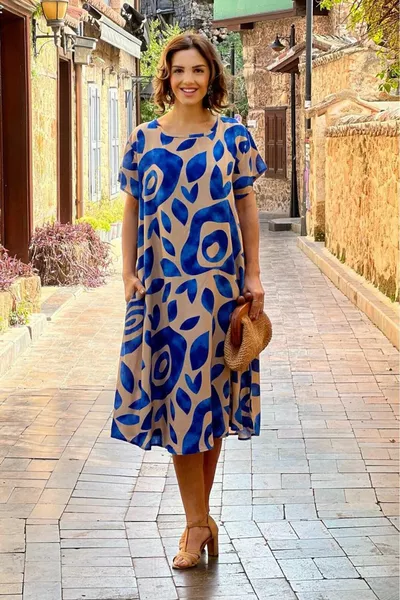 Robe à motifs moirés de couleur crème