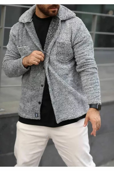 سترة من المخمل غير محددة الجنس بقصة عادية وتفاصيل جيوب