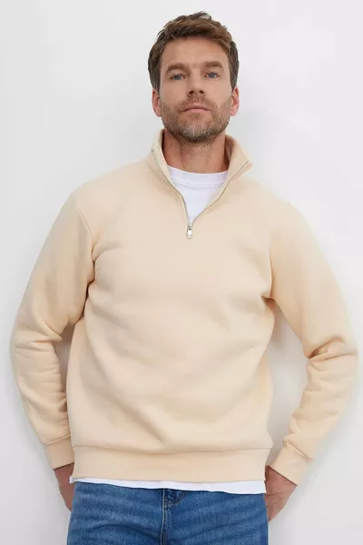 سويت شيرت بياقة عالية نصف سحاب، قطن مريح مبطن بالقطن داخلياً، بقصة فضفاضة للجنسين، بلون عاجي