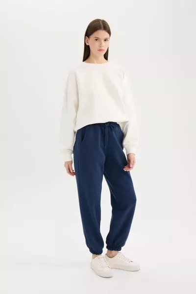 سروال رياضي سادة بساقين عريضة وقصة عادية، خصر وأطراف مطاطية، طويل، موديل WN