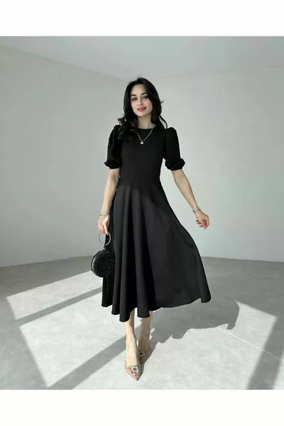 فستان ميدي بأكمام منقطة سوداء