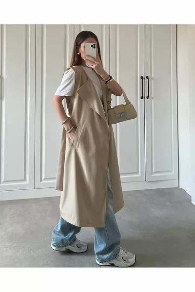 DESIGN PIECE THAT IS BOTH A VEST, A CROP TOP, AND A TRENCH COAT – MAGIC TRENCH COAT