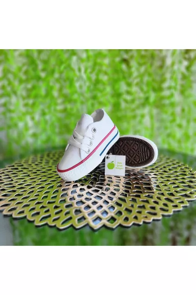 Licht brede pasvorm unisex kinder- en babysneakers met korte veters van linnen canvas