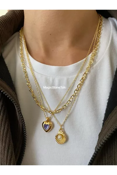 Золотое колье с тройной комбинацией и деталями из перламутровой жемчужины