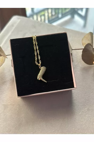 حذاء كاوبوي مطلي بالذهب من الفولاذ ٪ وسلسلة فولاذية