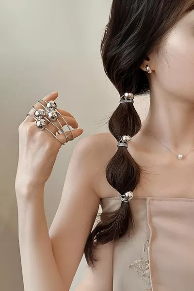 Set di 4 mollette elastiche colore argento