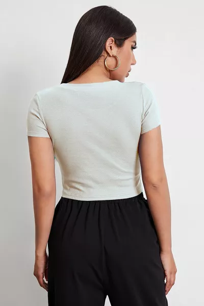 Camicetta corta bianca con scollo rotondo a mezza manica da donna