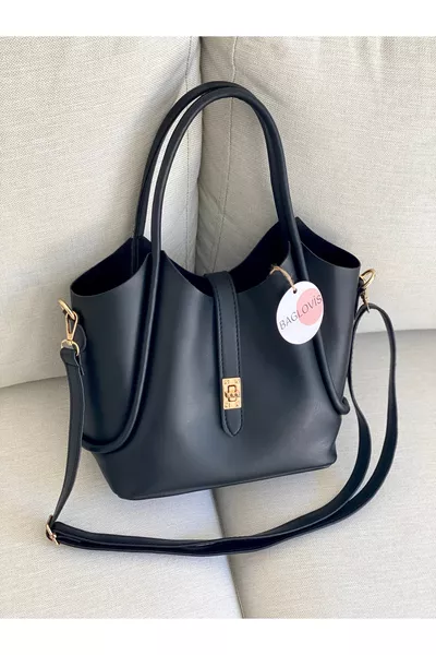 Borsa a spalla nera da donna con chiusura frontale e tasca extra