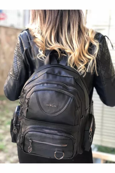حقيبة ظهر نسائية سوداء من الجلد القابل للغسل وعين متعددة من ساميلون