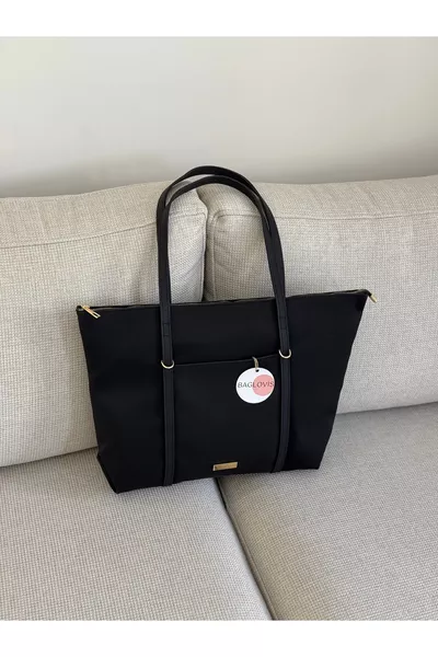 حقيبة كتف نسائية كبيرة سوداء بمقابض دائرية، العرض  سم، الارتفاع  سم