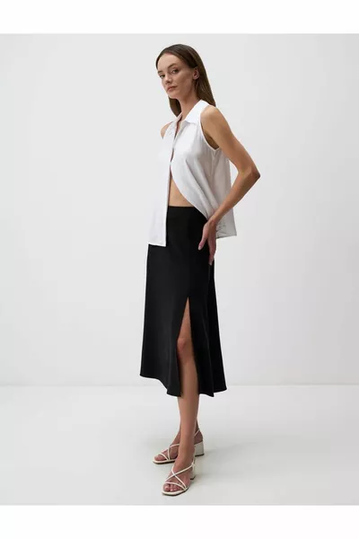 تنورة سوداء عالية الخصر الكتان ميدي مع الشقوق