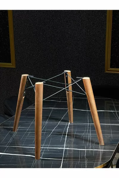 The chair leg is walnut, and the wire mesh is black.