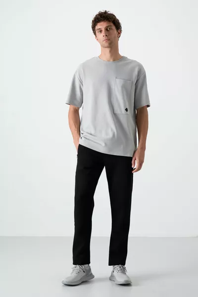 Pantaloni da tuta da uomo Carlo neri con risvolto in pelliccia - 