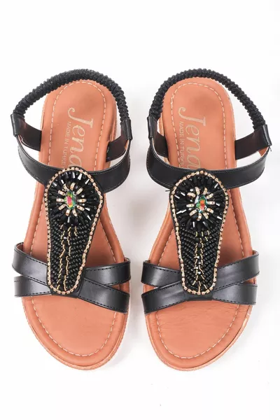 Geïmporteerde sandalen met platte zolen en stenen en elastische ruggen