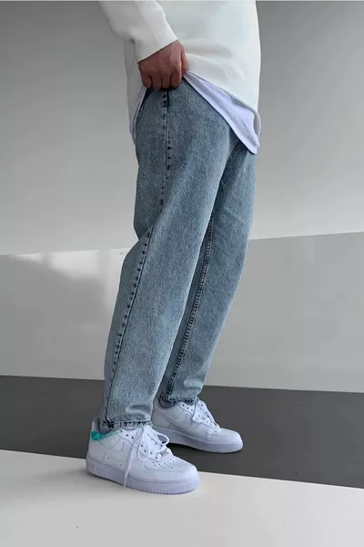 Jeans larghi con lavaggio acido Grind