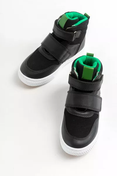 أحذية أطفال من الجلد الصناعي الأسود للأولاد