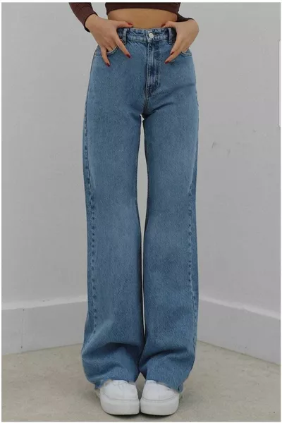 ليكرا سوبر عالية الخصر رث الجينز (مرتفع للغاية.) ساق واسعة.